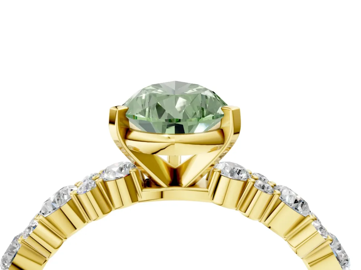 Fancy Green Pear Cut Diamond Side Stone Solitaire Ring with Round and Four-Prong Setting Yellow gold