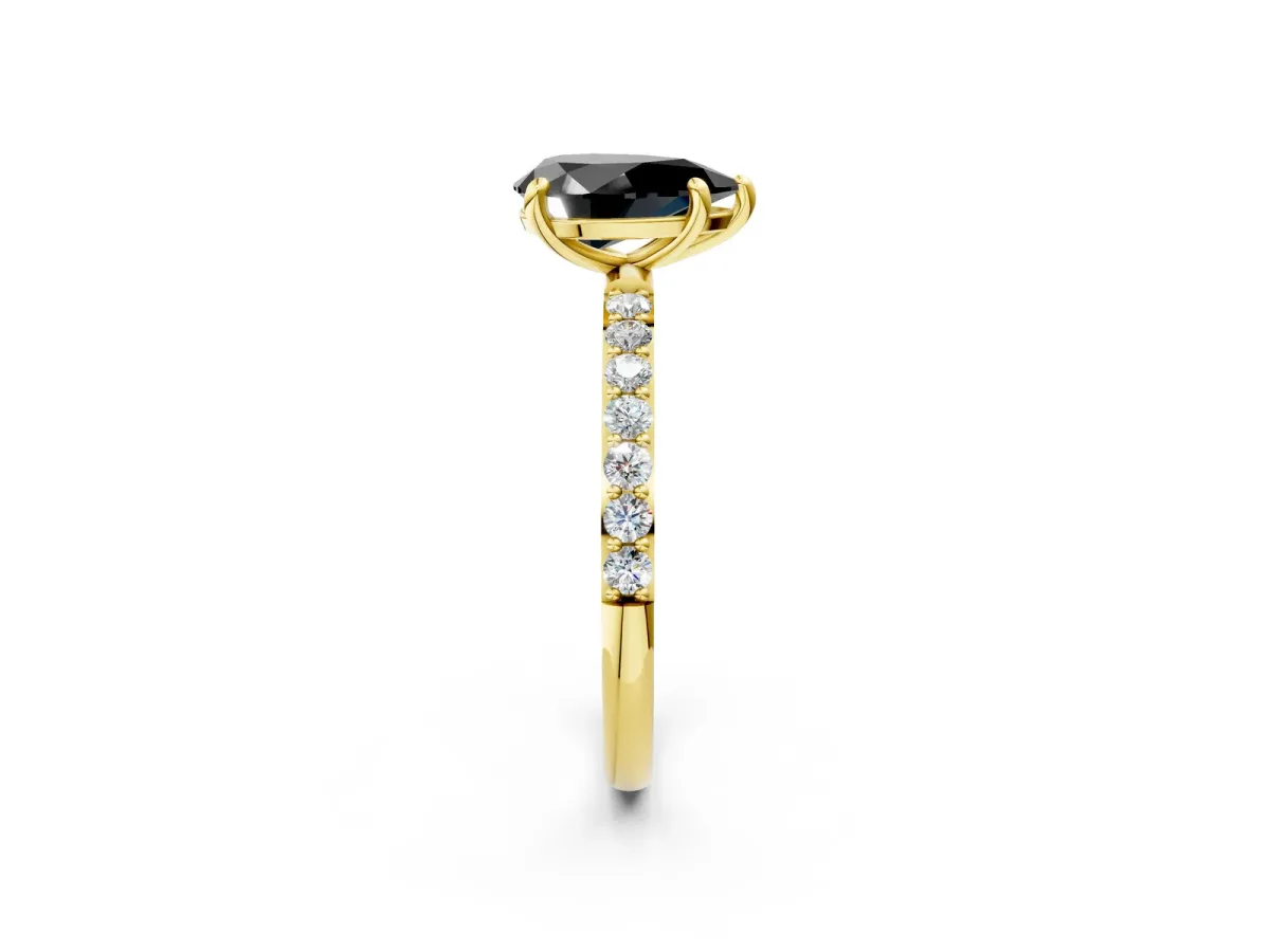 Fancy Black Pear Cut Diamond Solitaire Ring with Round Pavé Band and Prong Setting Yellow gold