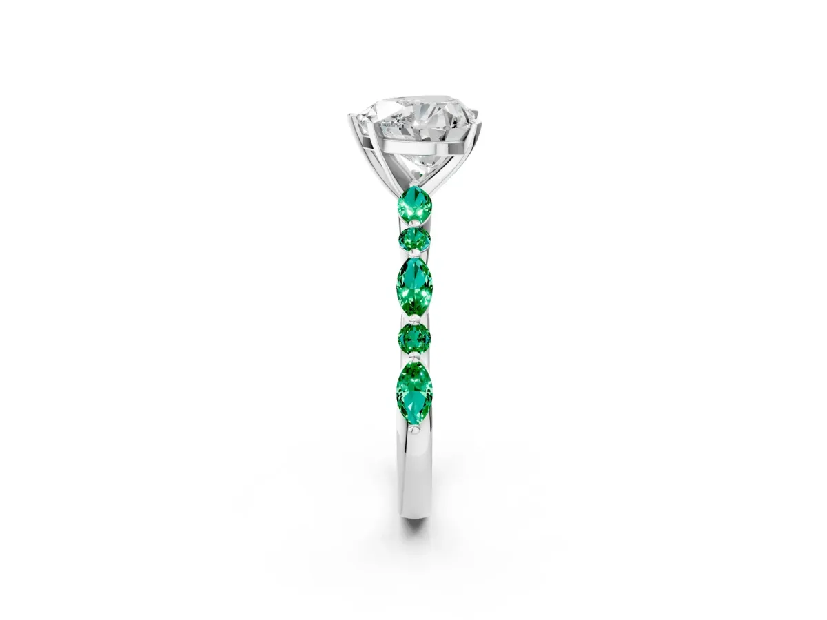Heart Cut Diamond Ring with Marquise and Round Emerald Side Stones and Four-Prong Setting Platinum