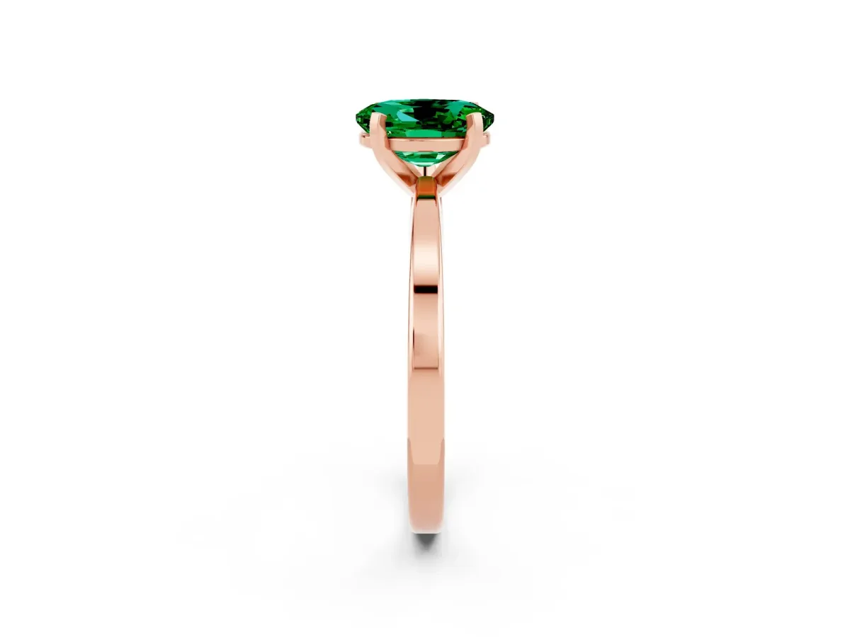 Oval Cut Emerald Solitaire Engagement Ring with Classic Band and Four-Prong Setting Rose gold