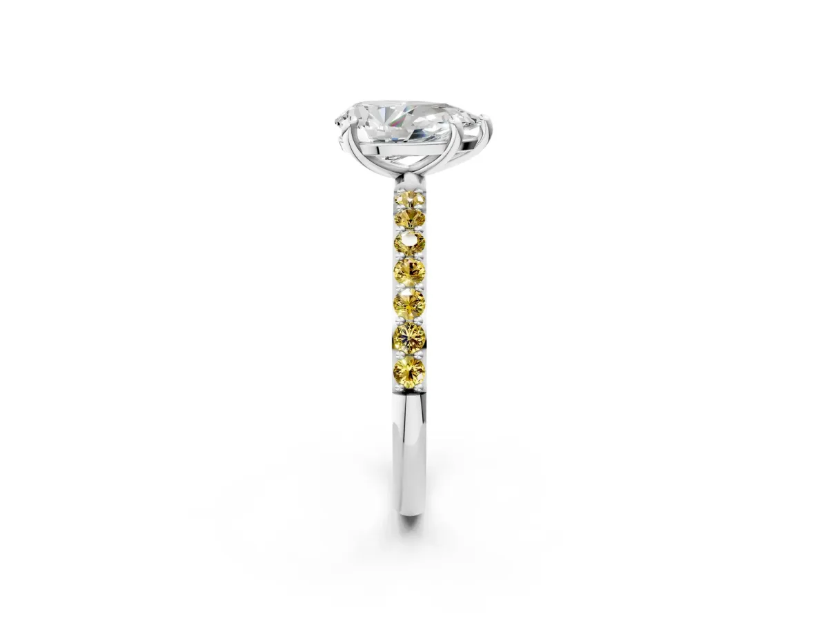 Pear Cut Diamond Solitaire Ring with Round Yellow Sapphire Pavé Band and Prong Setting Platinum