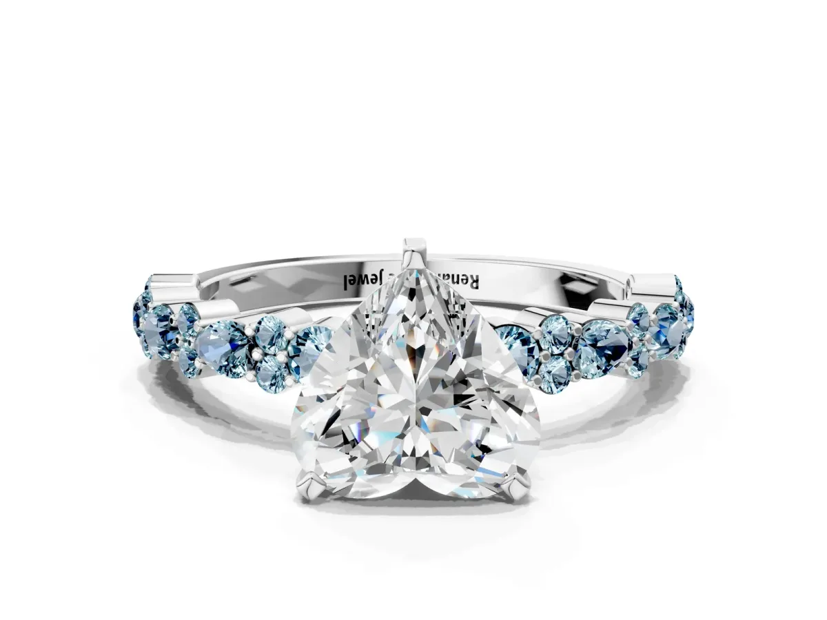 Heart Cut Diamond Side Stone Solitaire Ring with Round Aquamarine and Four-Prong Setting Platinum