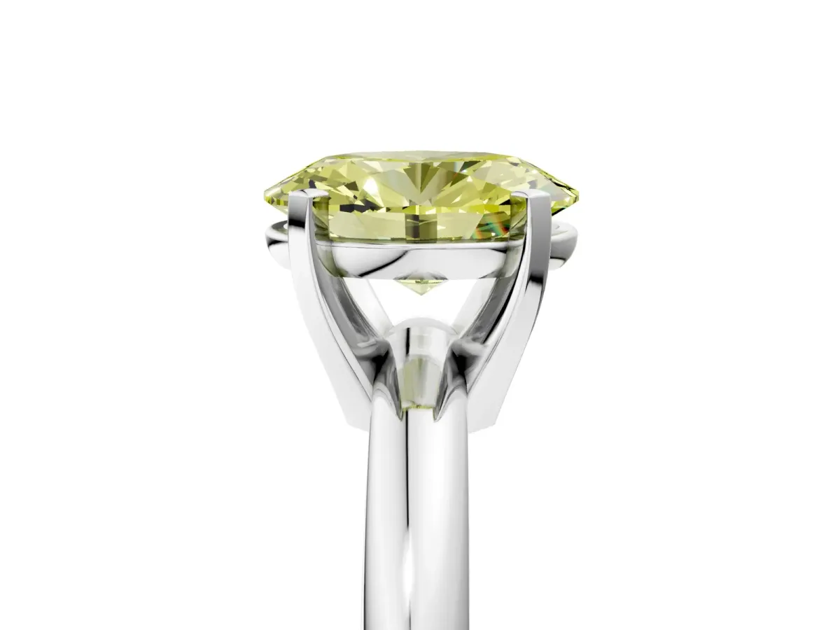 Fancy Yellow Oval Cut Diamond Solitaire Engagement Ring with Round Band and Four-Prong Setting Platinum