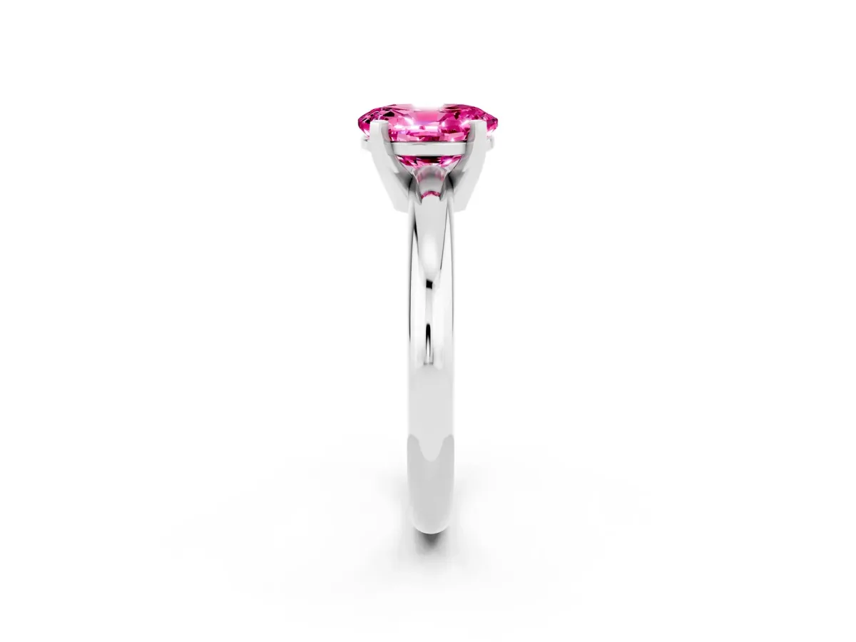 Oval Cut Pink Sapphire Solitaire Engagement Ring with Round Band and Four-Prong Setting Silver