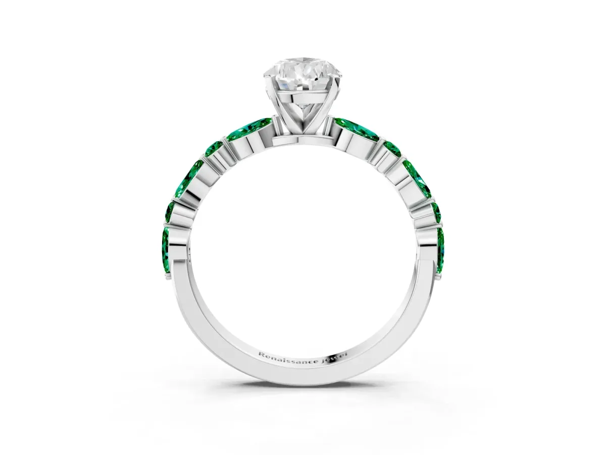 Pear Cut Diamond Ring with Marquise and Round Emerald Side Stones and Four-Prong Setting Silver