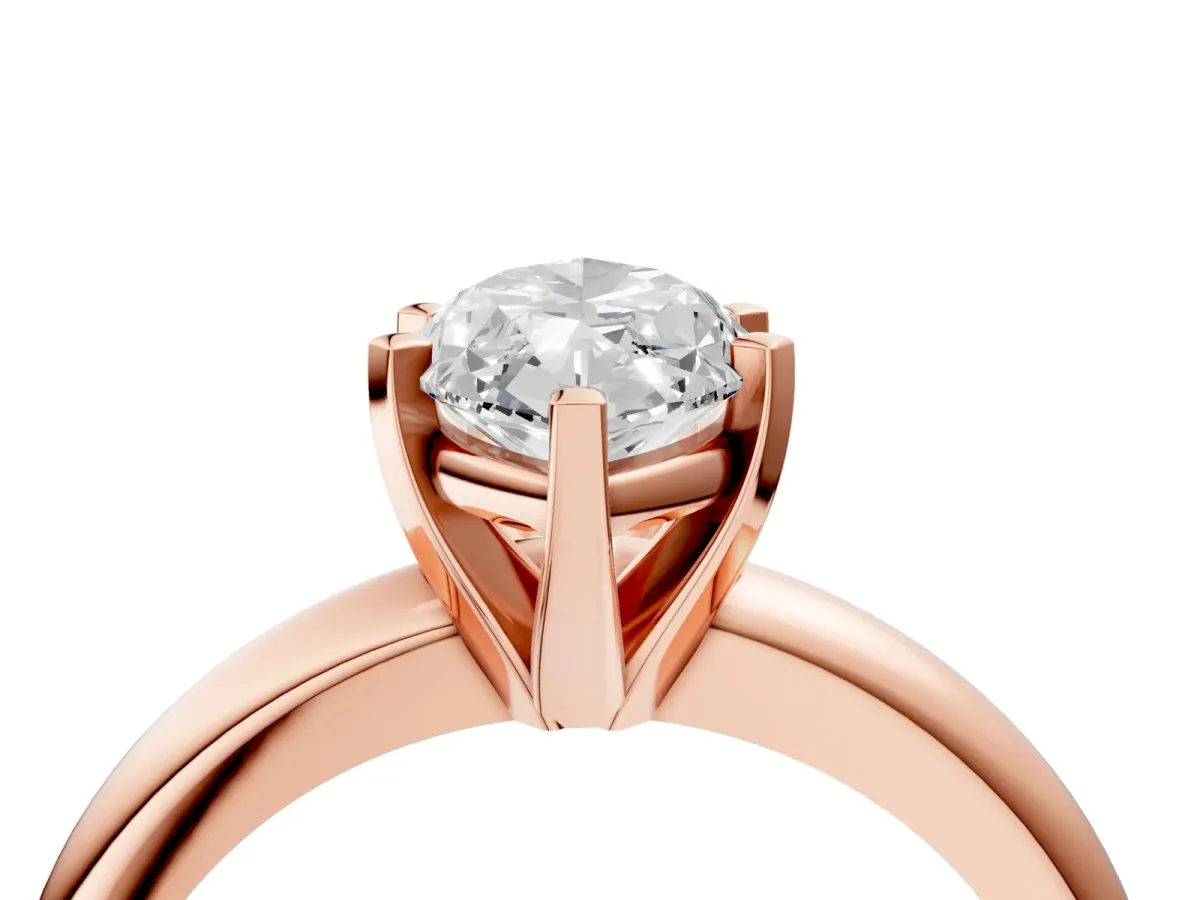 Marquise Cut Diamond Solitaire Engagement Ring with Round Band and Four-Prong Setting Rose gold