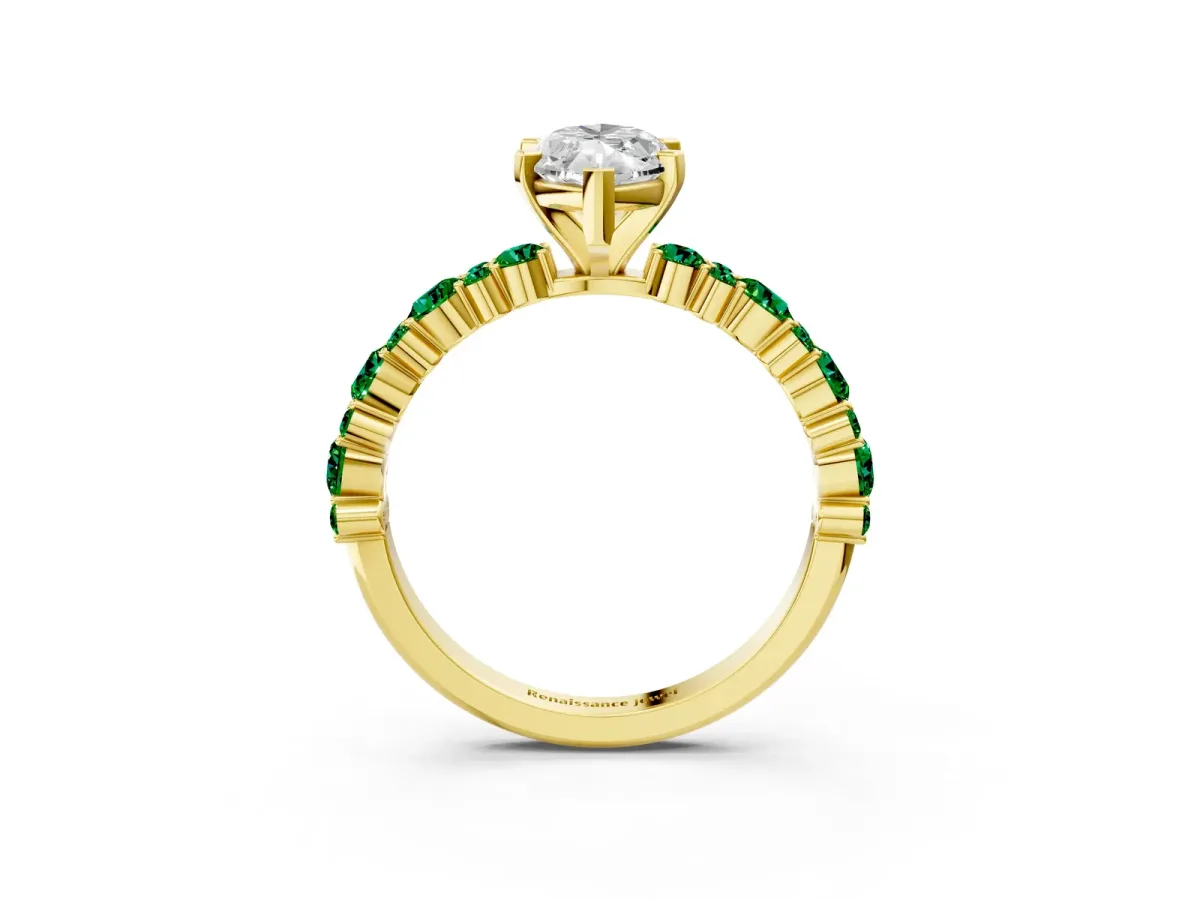 Marquise Cut Diamond Side Stone Solitaire Ring with Round Emerald and Four-Prong Setting Yellow gold
