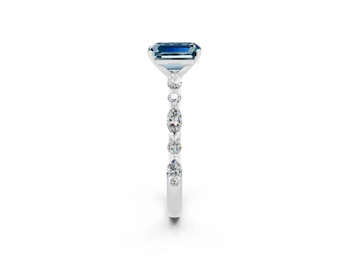 Emerald Cut Aquamarine Ring with Marquise and Round Side Stones and Four-Prong Setting Platinum