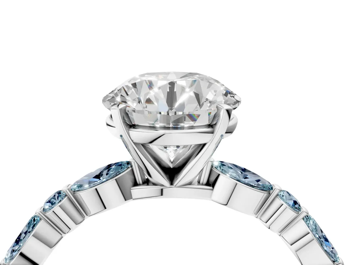 Round Cut Diamond Ring with Marquise and Round Aquamarine Side Stones and Four-Prong Setting Platinum