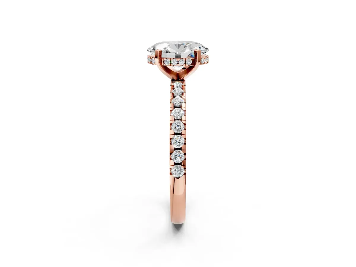Oval Cut Diamond Solitaire Ring with Round Moissanite Pavé Band and Four-Prong Setting Rose gold