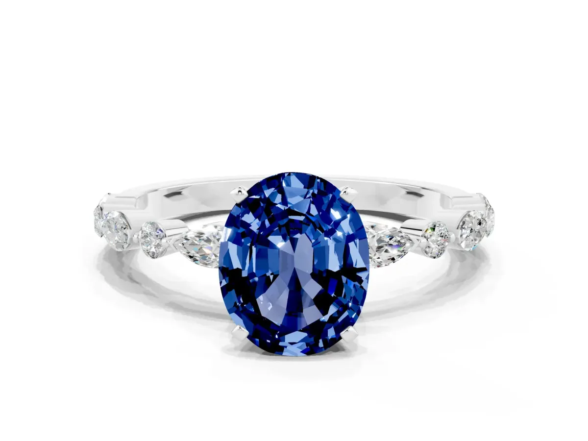 Oval Cut Blue Sapphire Ring with Marquise and Round Side Stones and Four-Prong Setting Silver