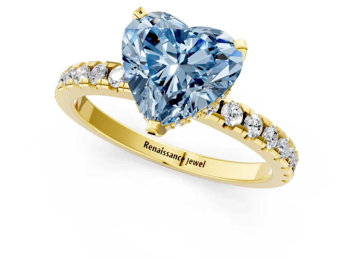 Fancy Blue Heart Cut Diamond Solitaire Ring with Round Pavé Band and Four-Prong Setting Yellow gold