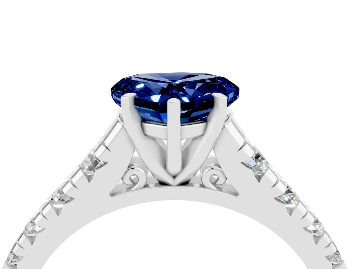Heart Cut Blue Sapphire Cathedral Solitaire Ring with Round Pavé Band Platinum