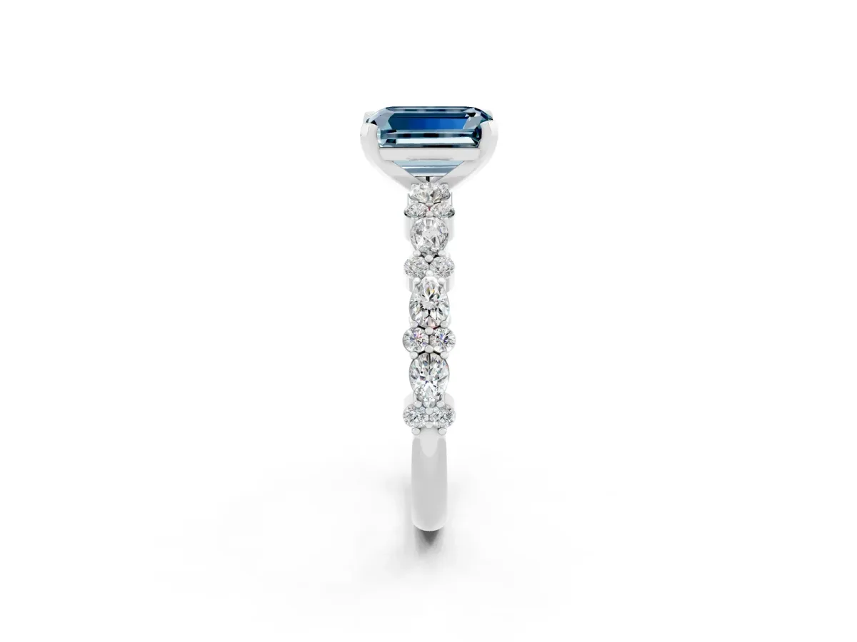 Emerald Cut Aquamarine Side Stone Solitaire Ring with Round and Four-Prong Setting White gold