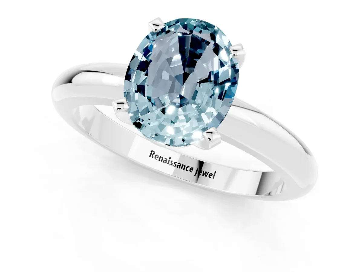 Oval Cut Aquamarine Solitaire Engagement Ring with Round Band and Four-Prong Setting Platinum