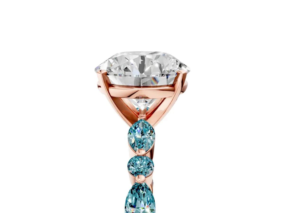 Round Cut Diamond Ring with Marquise and Round Blue Topaz Side Stones and Four-Prong Setting Rose gold