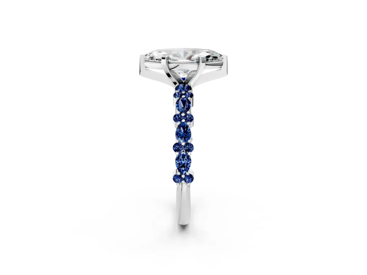 Marquise Cut Diamond Side Stone Solitaire Ring with Round Blue Sapphire and Four-Prong Setting White gold