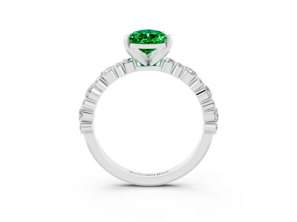 Pear Cut Emerald Side Stone Solitaire Ring with Round and Four-Prong Setting White gold