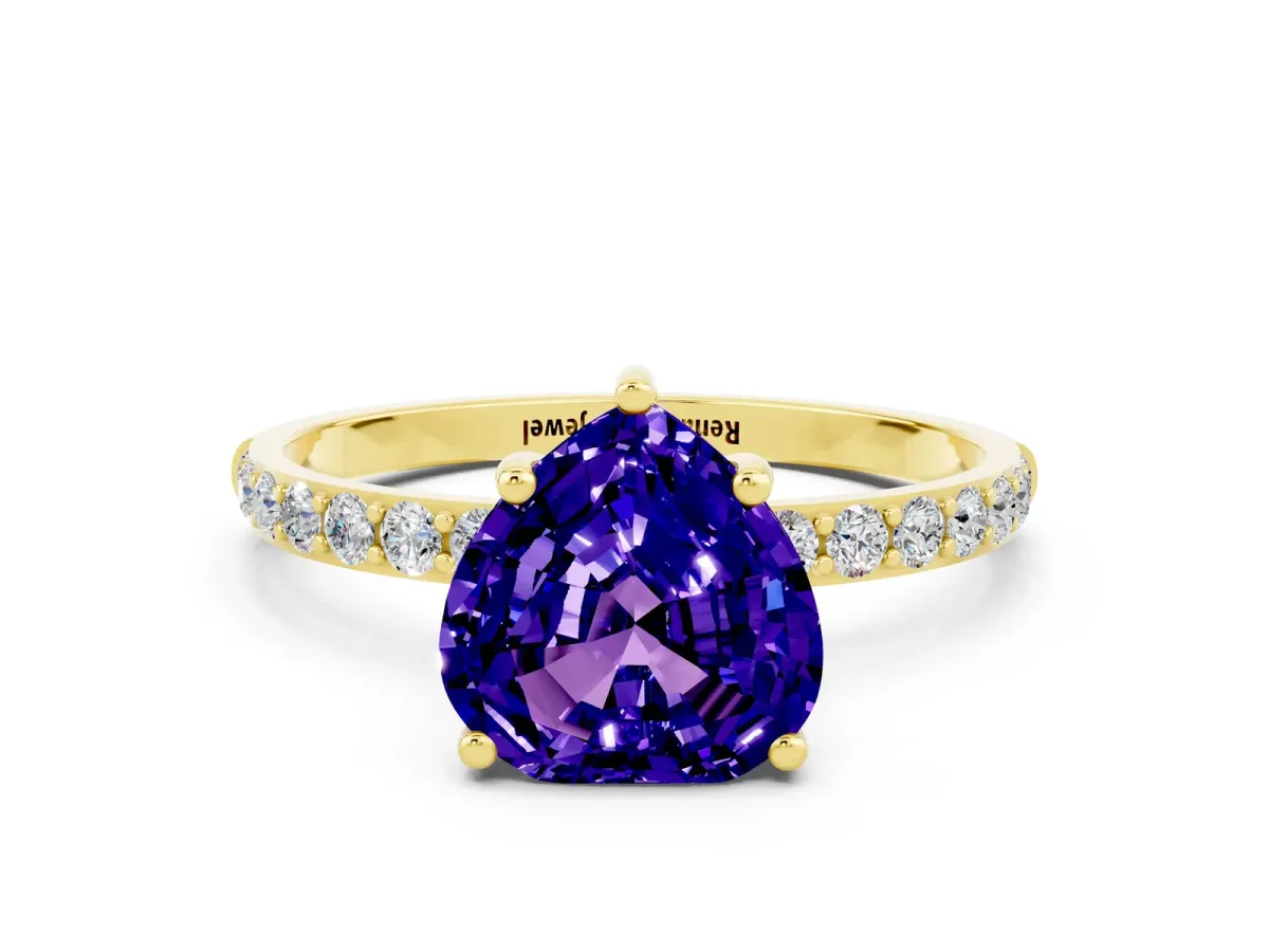 Heart Cut Tanzanite Solitaire Ring with Round Pavé Band and Prong Setting Yellow gold