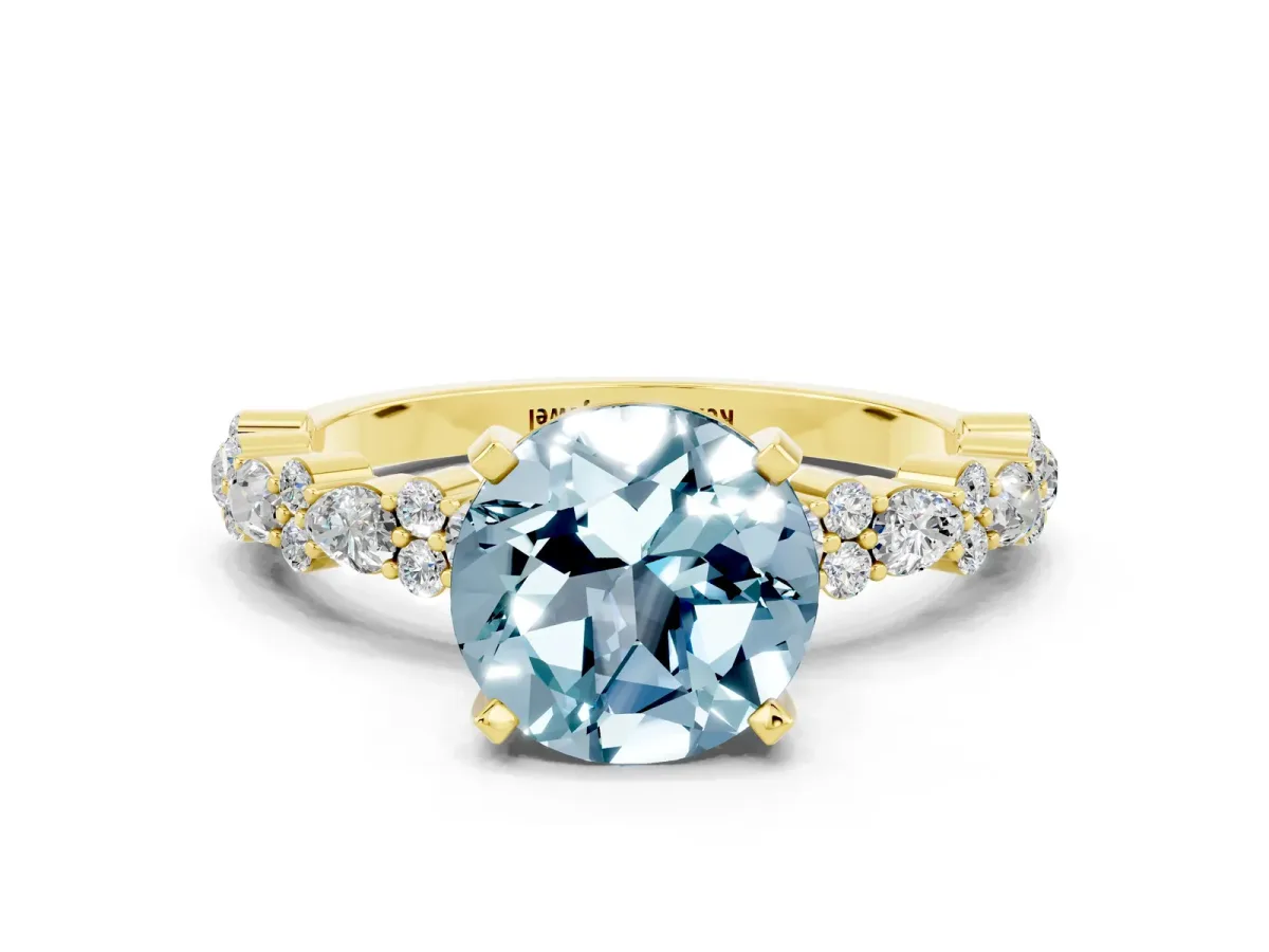 Round Cut Aquamarine Side Stone Solitaire Ring with Round and Four-Prong Setting Yellow gold