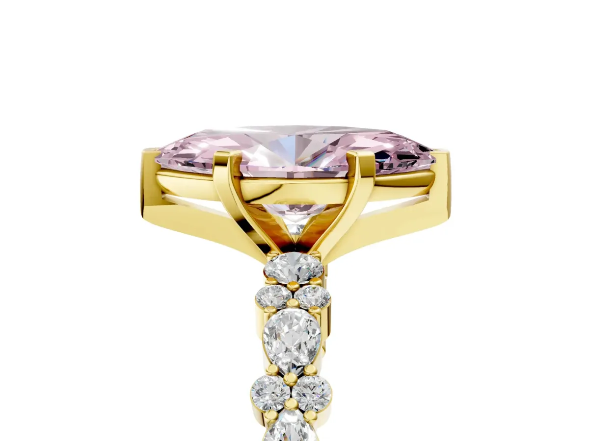Fancy Pink Marquise Cut Diamond Side Stone Solitaire Ring with Round and Four-Prong Setting Yellow gold