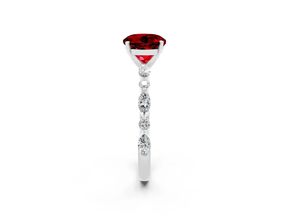 Round Cut Ruby Ring with Marquise and Round Side Stones and Four-Prong Setting Silver
