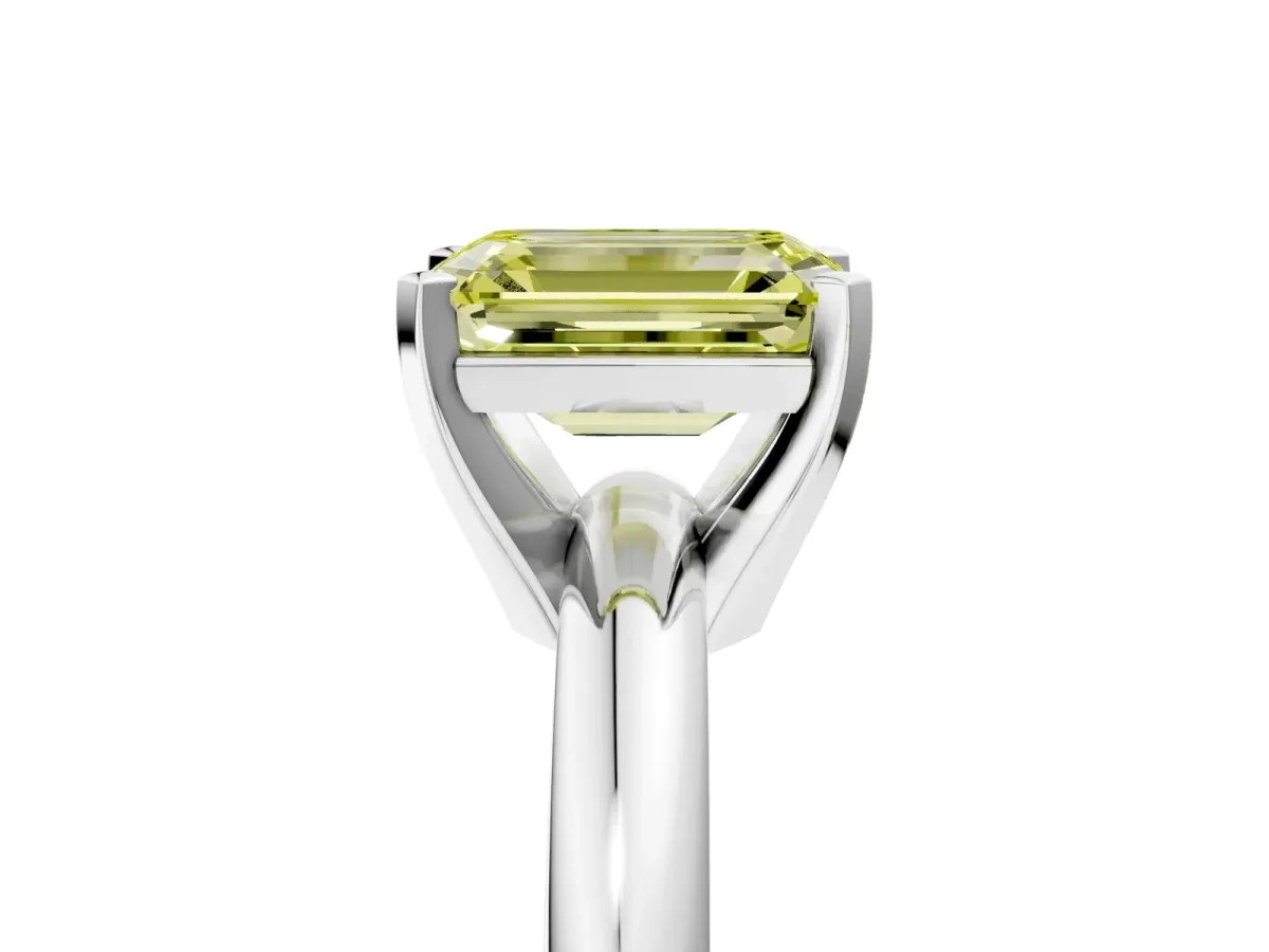 Fancy Yellow Emerald Cut Diamond Solitaire Engagement Ring with Round Band and Four-Prong Setting White gold
