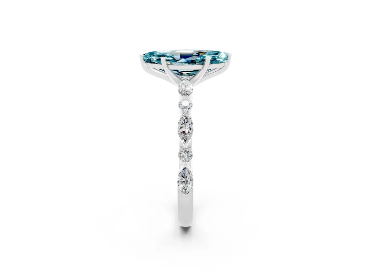 Marquise Cut Blue Topaz Ring with Marquise and Round Side Stones and Four-Prong Setting Silver