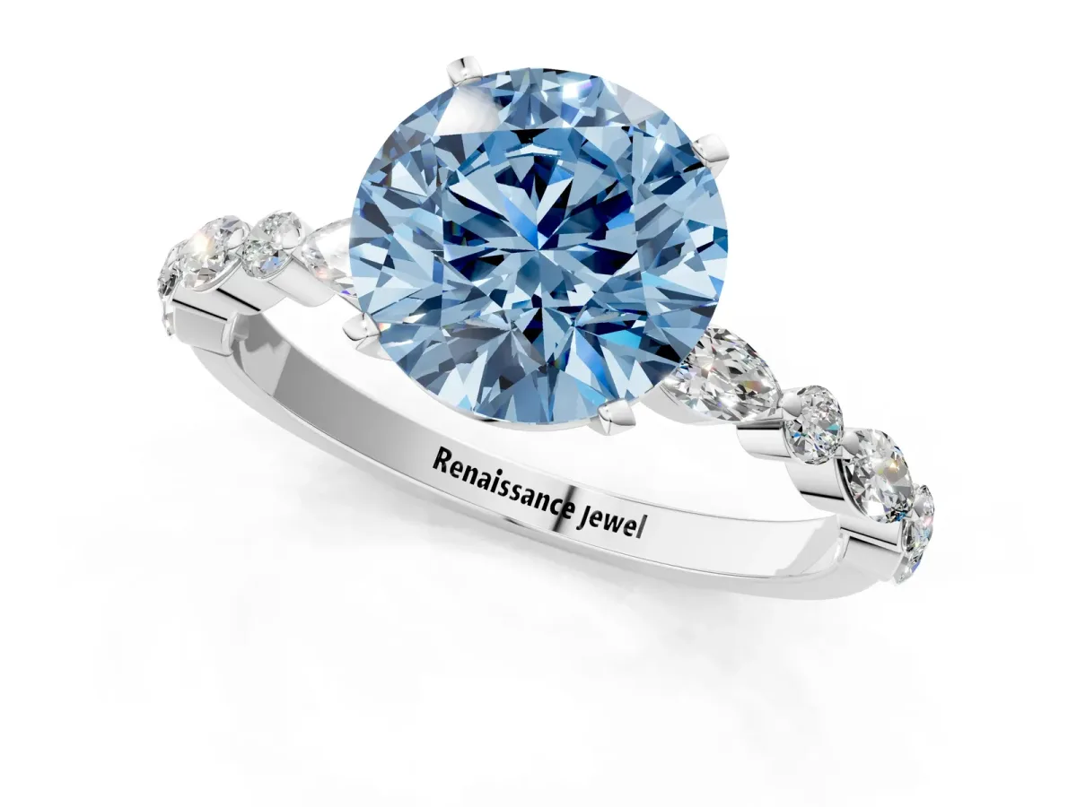 Fancy Blue Round Cut Diamond Ring with Marquise and Round Side Stones and Four-Prong Setting White gold