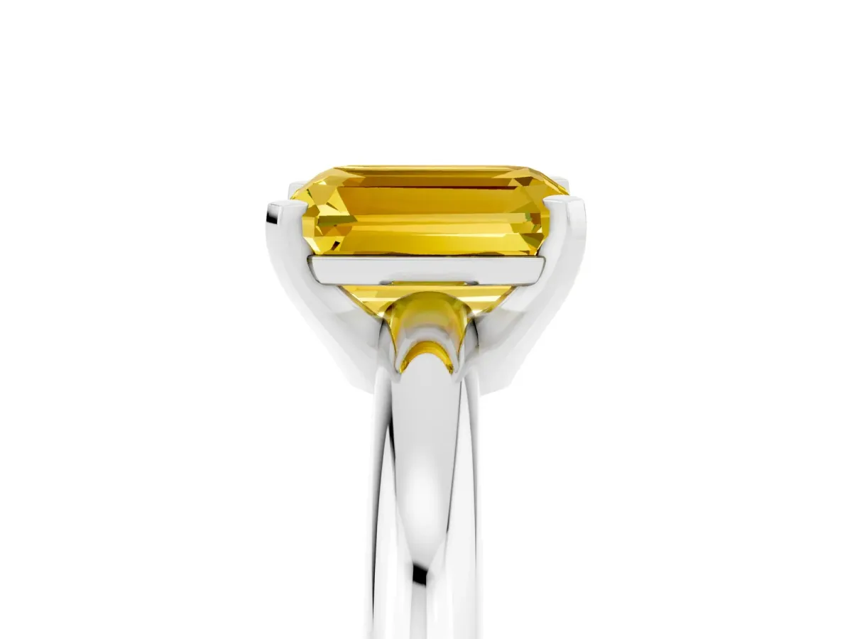 Emerald Cut Yellow Sapphire Solitaire Engagement Ring with Round Band and Four-Prong Setting Silver
