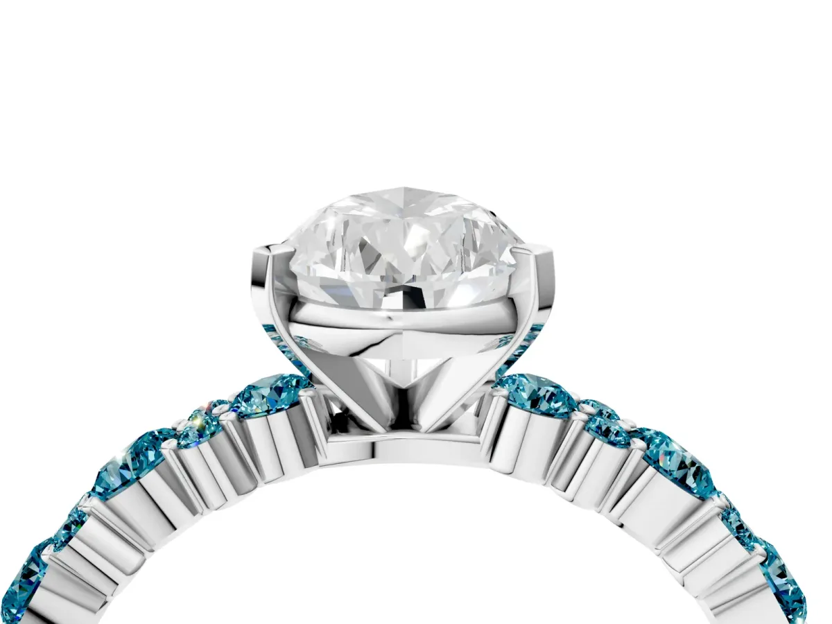 Pear Cut Diamond Side Stone Solitaire Ring with Round Blue Topaz and Four-Prong Setting Platinum