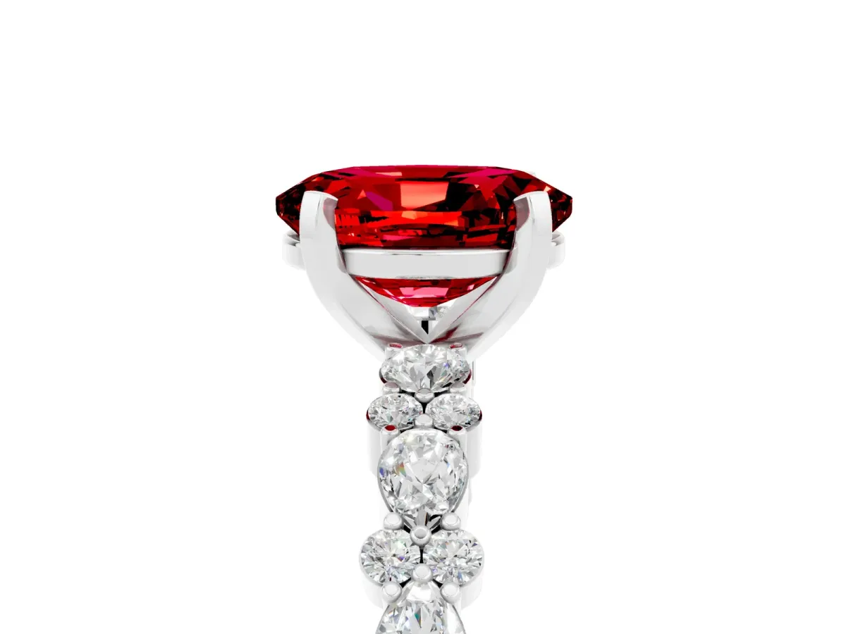 Oval Cut Ruby Side Stone Solitaire Ring with Round and Four-Prong Setting White gold