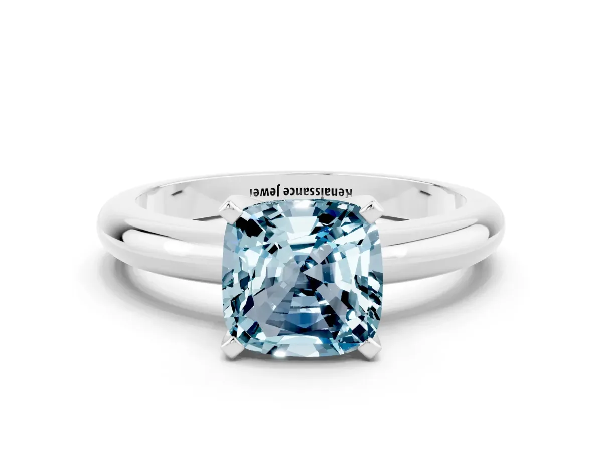 Cushion Cut Aquamarine Solitaire Engagement Ring with Round Band and Four-Prong Setting Silver
