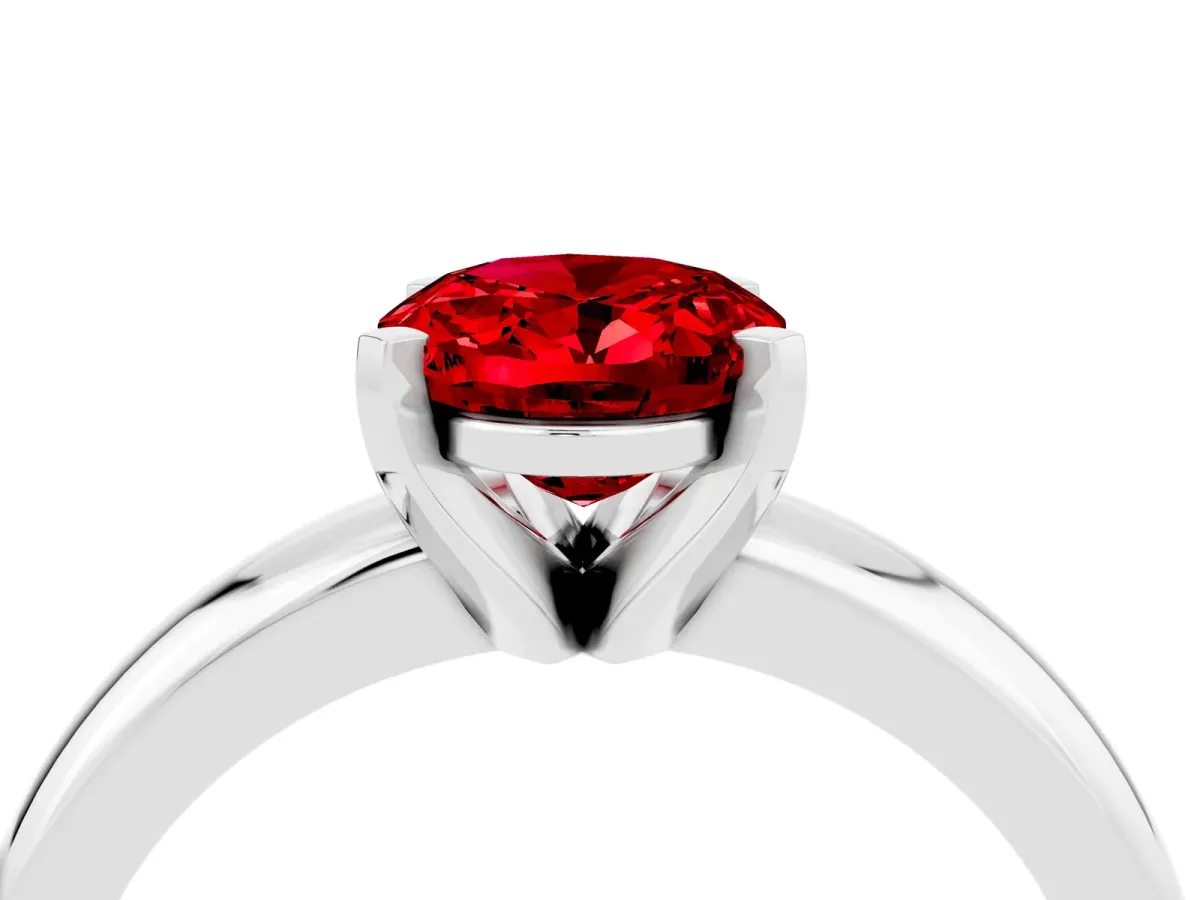 Oval Cut Ruby Solitaire Engagement Ring with Round Band and Four-Prong Setting Platinum