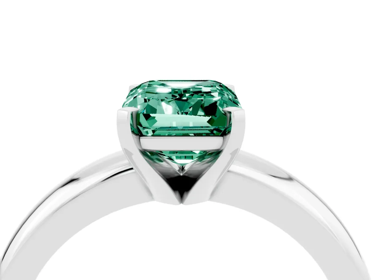 Emerald Cut Green Sapphire Solitaire Engagement Ring with Round Band and Four-Prong Setting Platinum