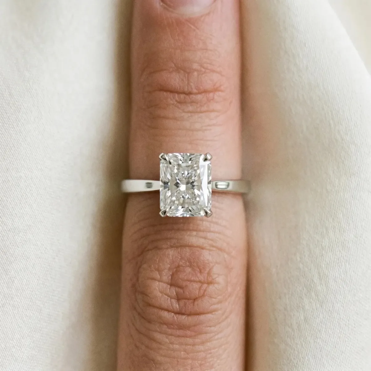 Radiant Cut Diamond Solitaire Engagement Ring with Classic Band and Four-Prong Setting Platinum