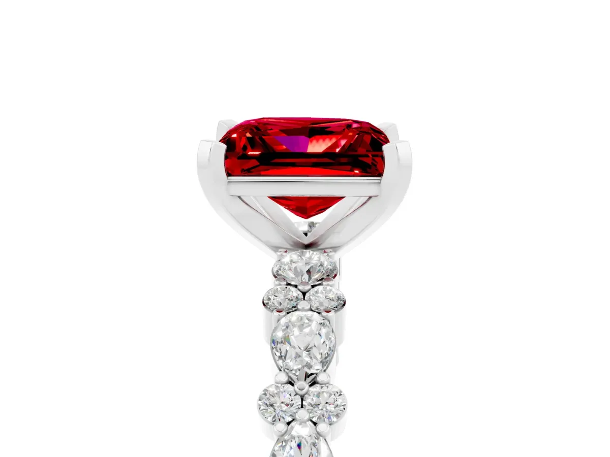 Princess Cut Ruby Side Stone Solitaire Ring with Round and Four-Prong Setting Platinum
