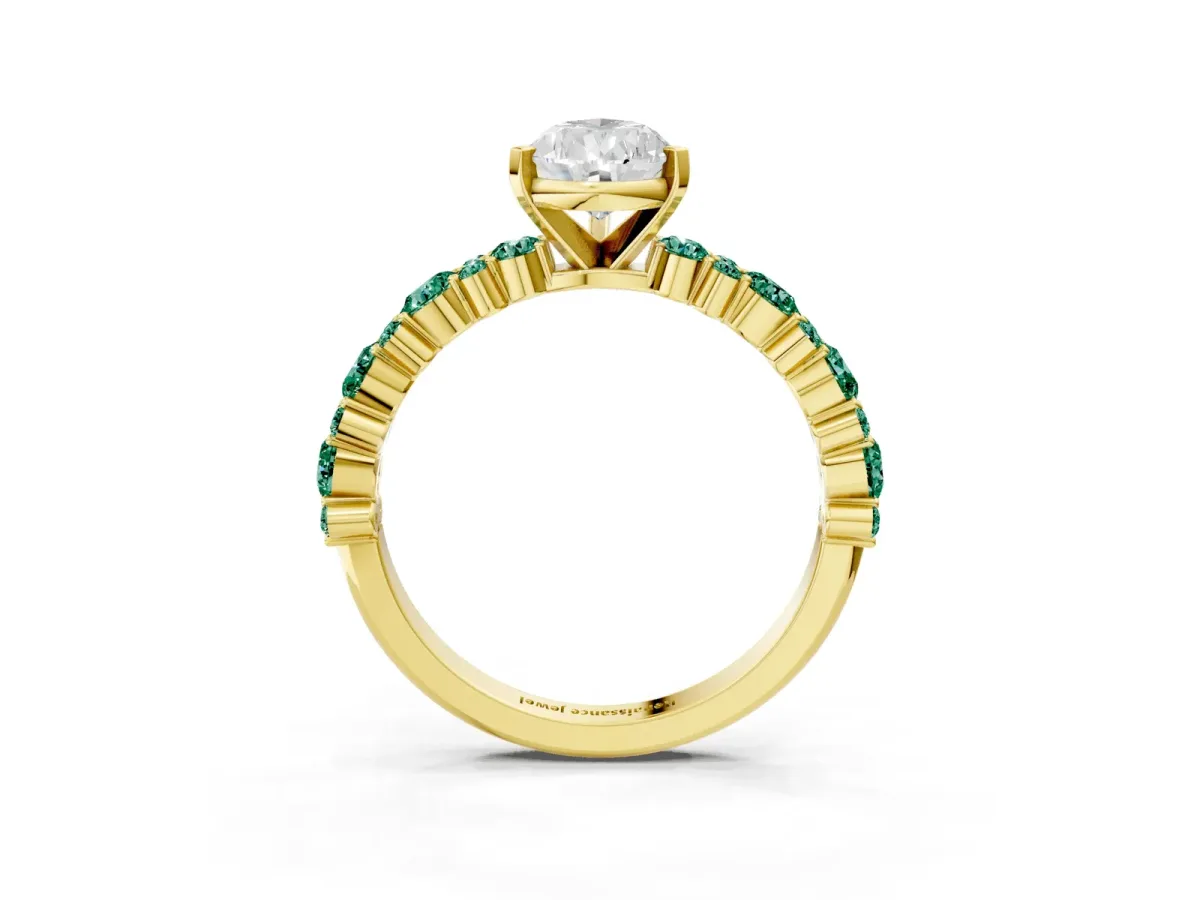 Pear Cut Diamond Side Stone Solitaire Ring with Round Green Sapphire and Four-Prong Setting Yellow gold