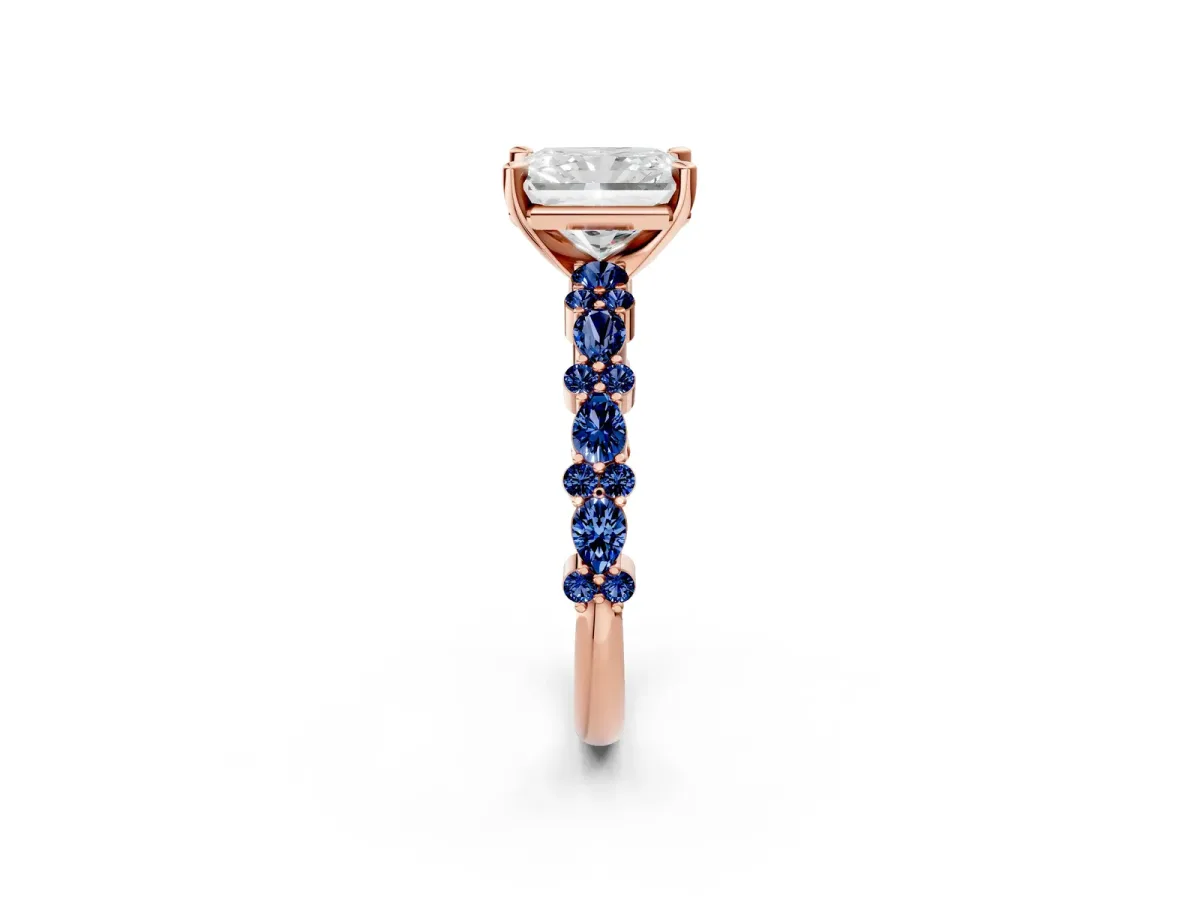 Radiant Cut Diamond Side Stone Solitaire Ring with Round Blue Sapphire and Four-Prong Setting Rose gold