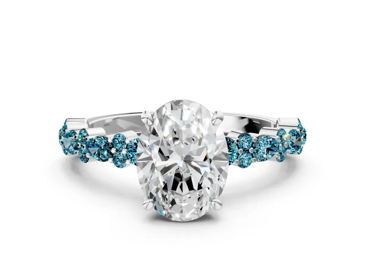 Oval Cut Diamond Side Stone Solitaire Ring with Round Blue Topaz and Four-Prong Setting White gold