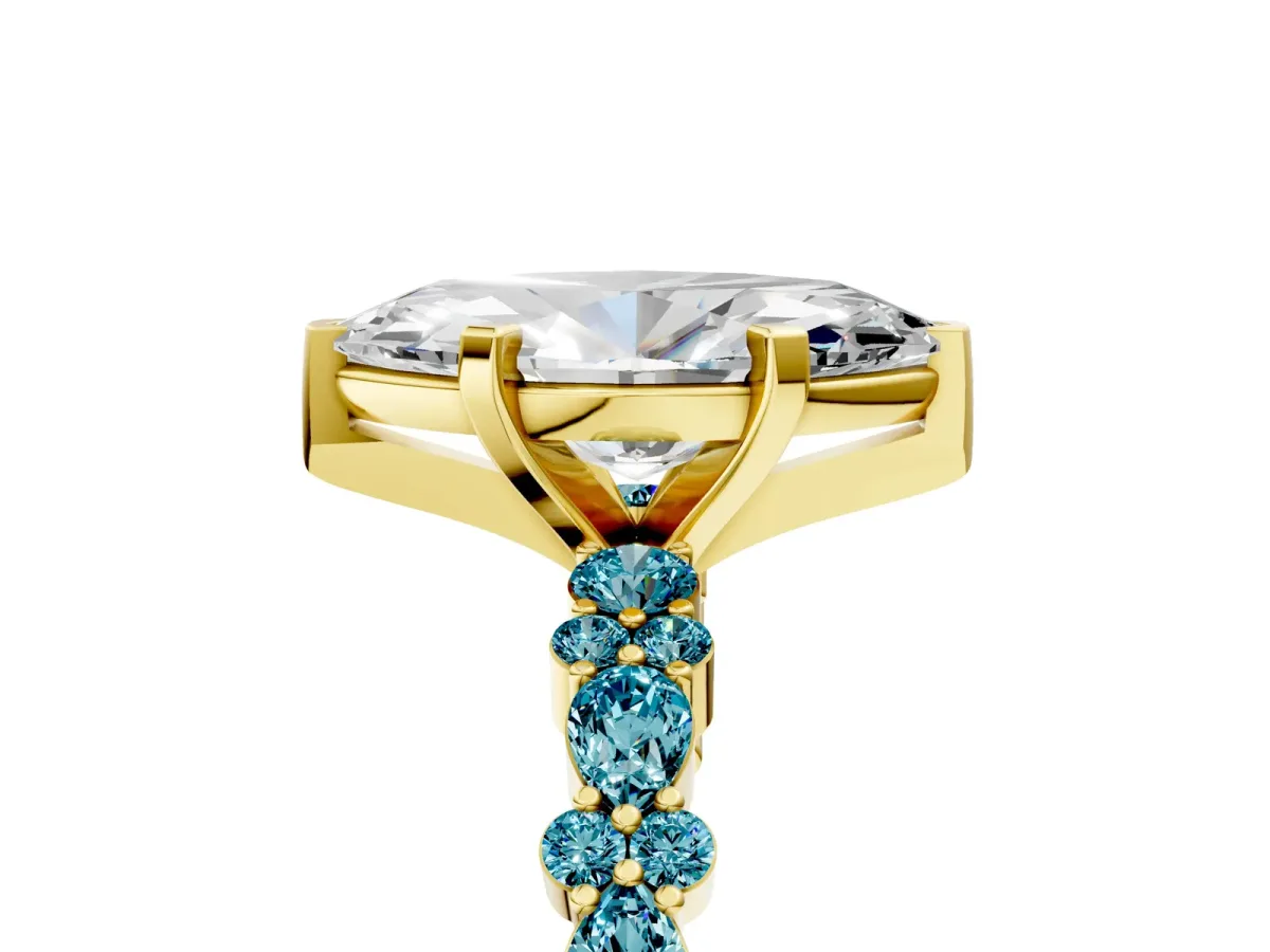 Marquise Cut Diamond Side Stone Solitaire Ring with Round Blue Topaz and Four-Prong Setting Yellow gold
