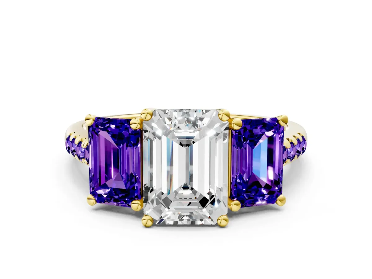 Three-Stone Emerald Cut Diamond Ring with Round Tanzanite Pavé Band and Prong Setting Yellow gold