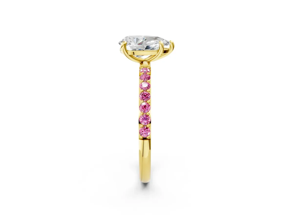 Pear Cut Diamond Solitaire Ring with Round Pink Sapphire Pavé Band and Prong Setting Yellow gold