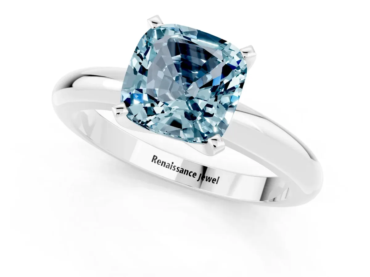 Cushion Cut Aquamarine Solitaire Engagement Ring with Round Band and Four-Prong Setting Silver