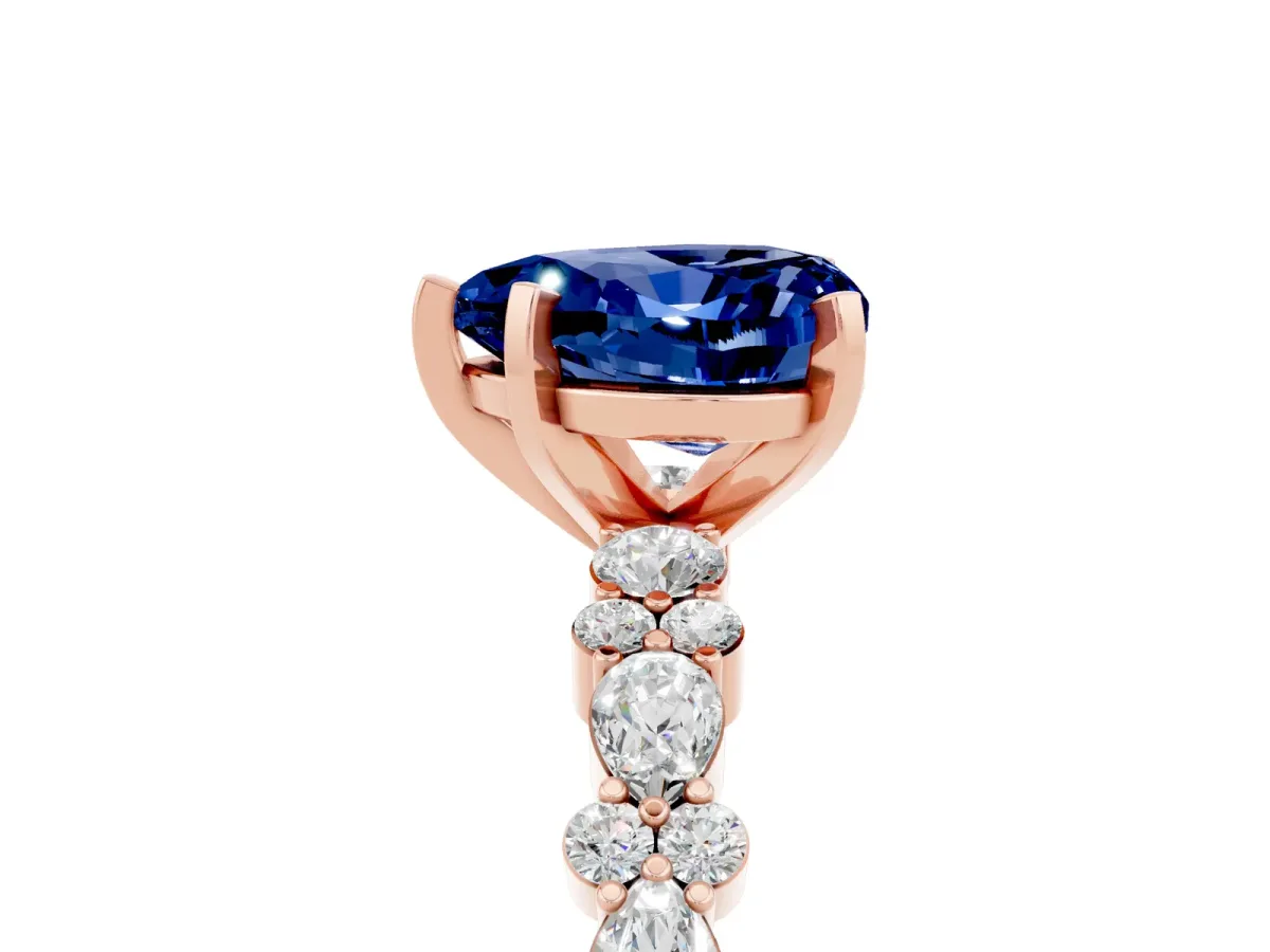 Heart Cut Blue Sapphire Side Stone Solitaire Ring with Round and Four-Prong Setting Rose gold