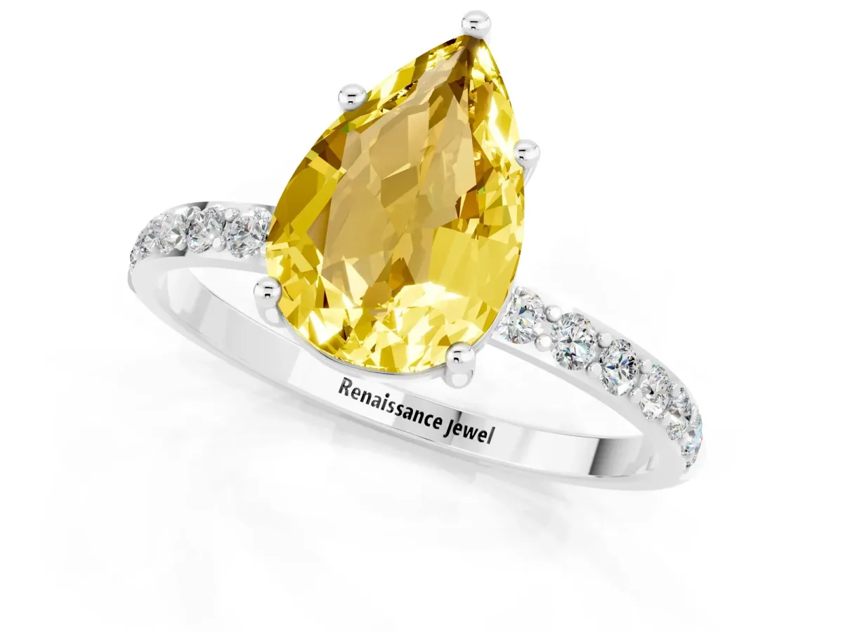 Pear Cut Yellow Sapphire Solitaire Ring with Round Pavé Band and Prong Setting Silver