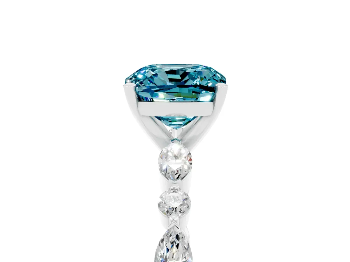 Cushion Cut Blue Topaz Ring with Marquise and Round Side Stones and Four-Prong Setting Silver