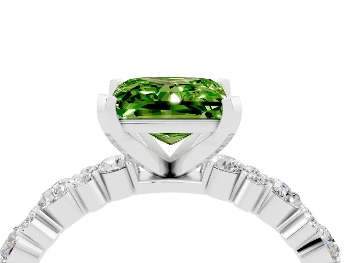 Princess Cut Peridot Side Stone Solitaire Ring with Round and Four-Prong Setting Platinum