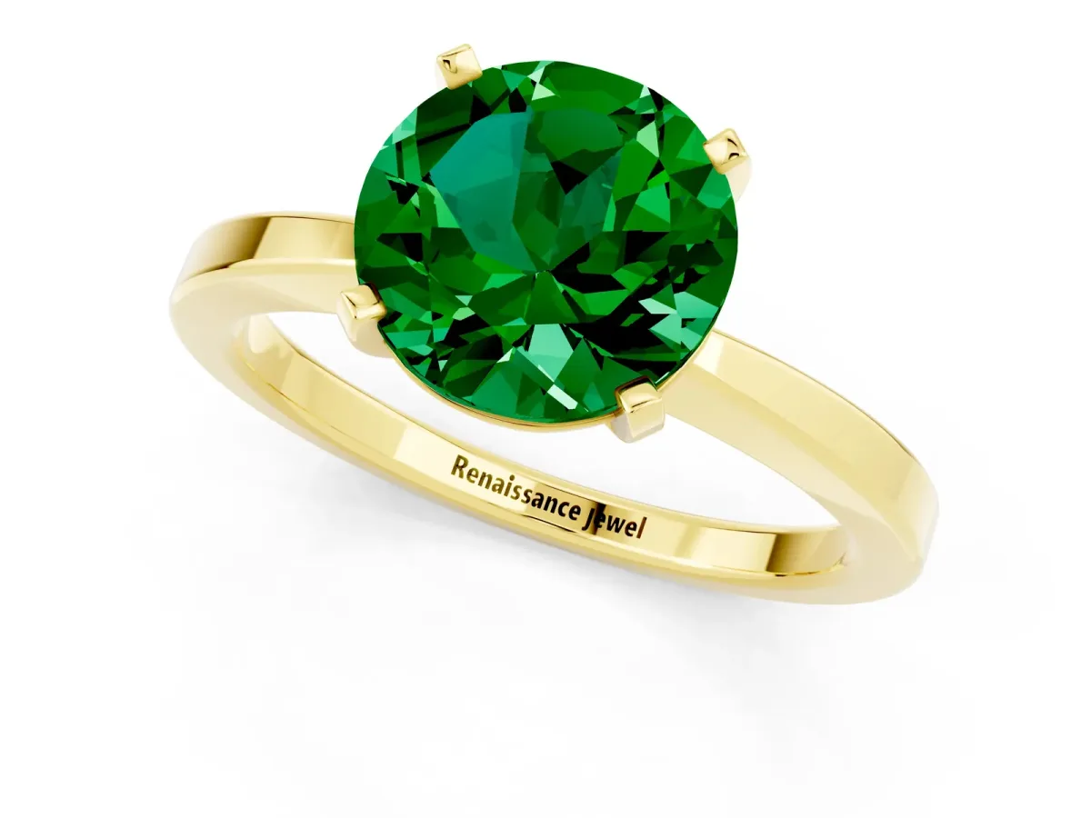 Round Cut Emerald Solitaire Engagement Ring with Classic Band and Four-Prong Setting Yellow gold