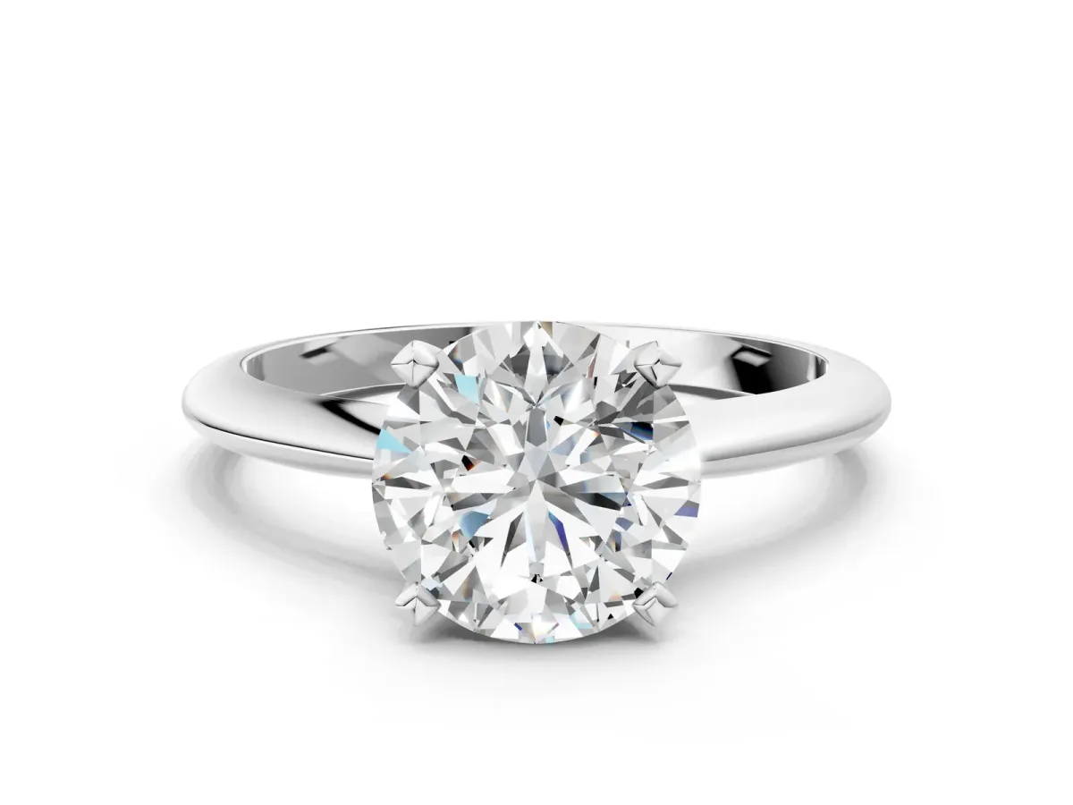 Round Cut Diamond Solitaire Engagement Ring with Classic Band and Four-Prong Setting White gold